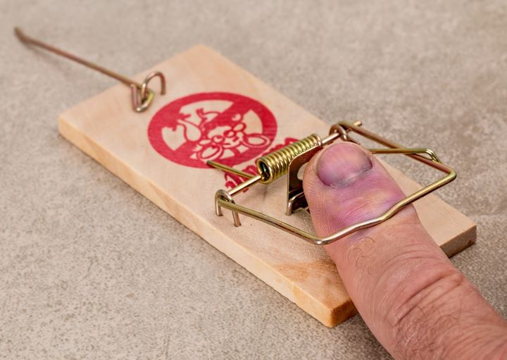 Finger stuck in mousetrap