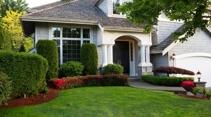 Home with manicured beds