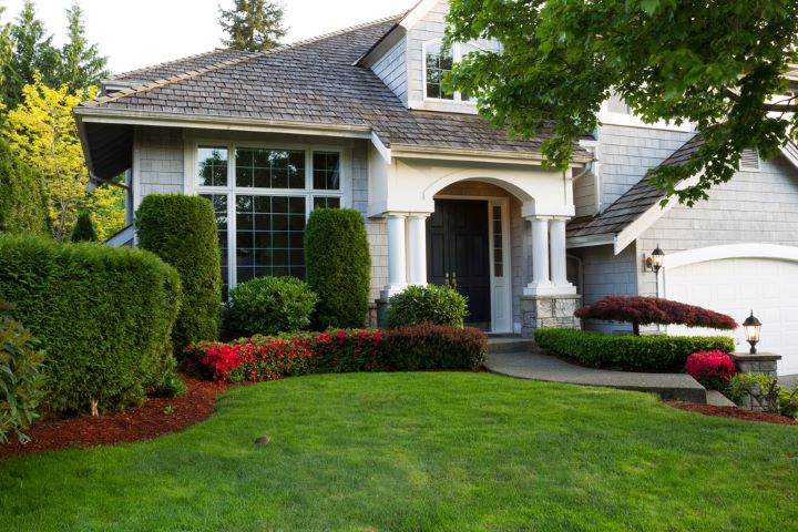 Home with manicured beds