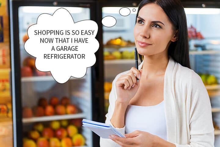 Woman thinking about her garage refrigerator