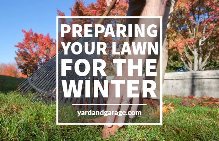 man picking up leaf while raking yard