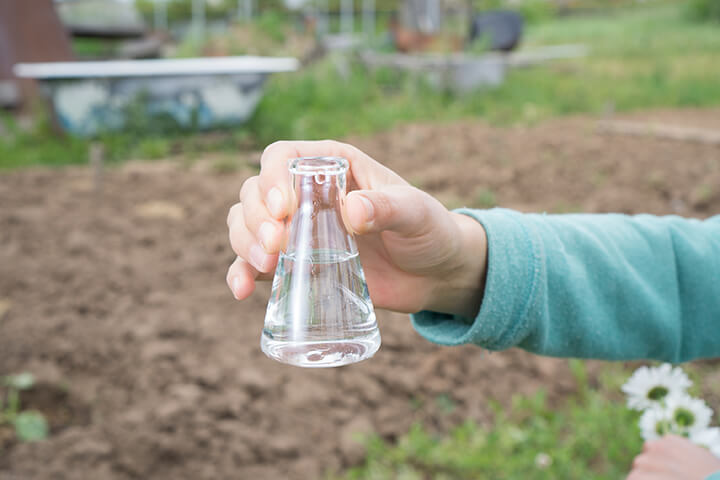 soil in a laboratory beaker