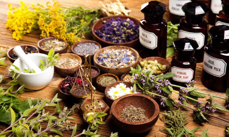 dried aromatheraphy plants in pestles