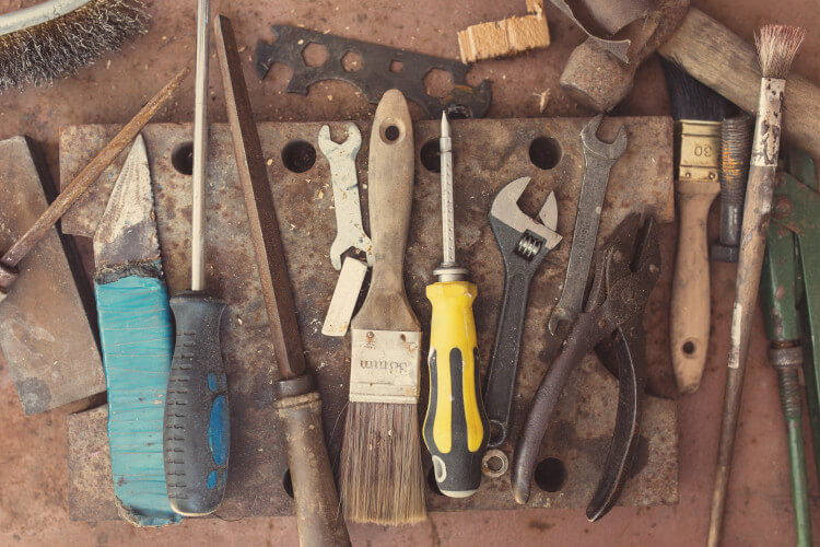 set of dirty and rusty hand tools