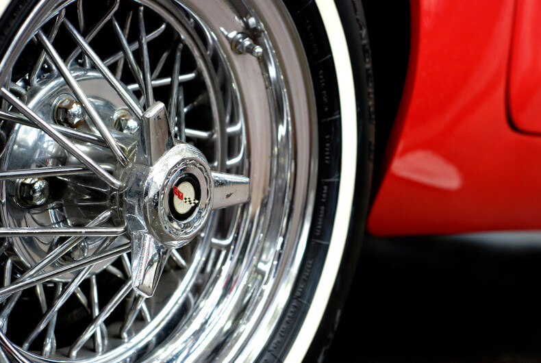 shiny sports car rim and tire
